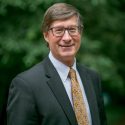 Headshot of Matt Morrison, CEO of PNWER, speaking at IMPACT Conference.